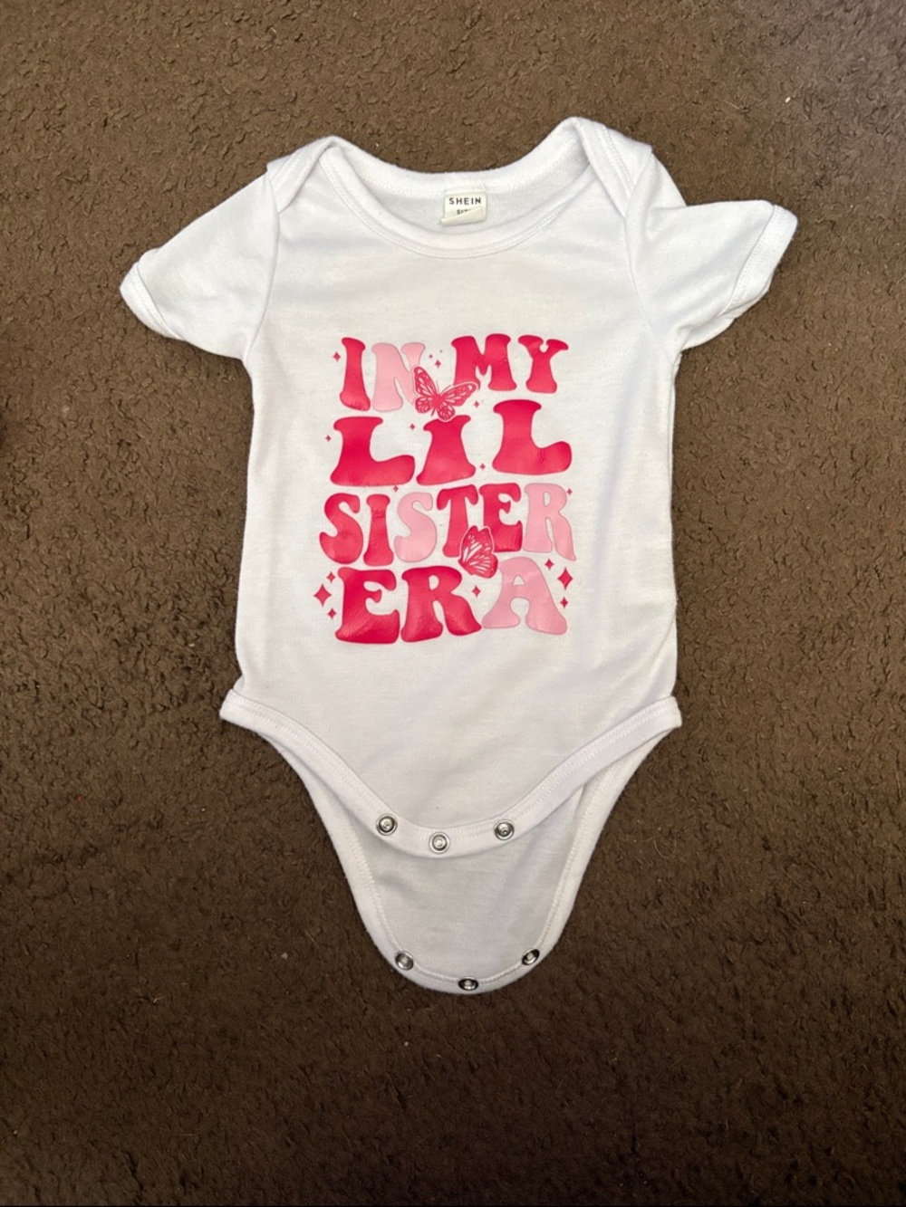 SHEIN White Baby Bodysuit with Pink 'In My Lil Sister Era' Graphic w 🦋